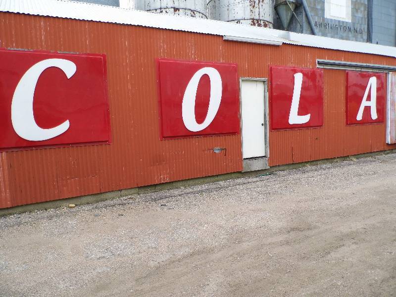 lot 319 image: C O L A Signs