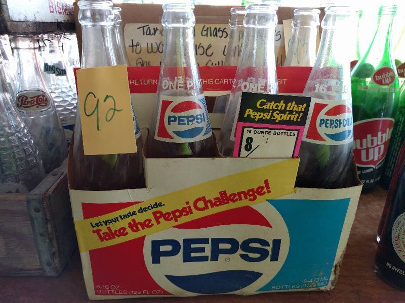 lot 92 image: Pepsi Bottles w Cardboard Case