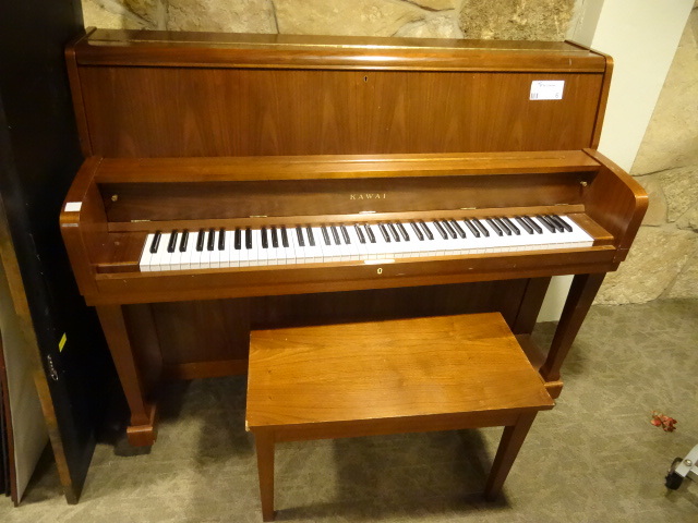 lot 6 image: Kawai Piano On Wheels