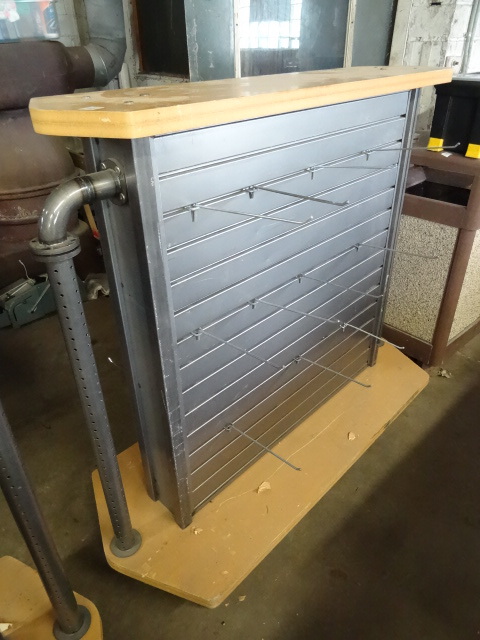 lot 41 image: Double Sided Metal Slat Wall Rack