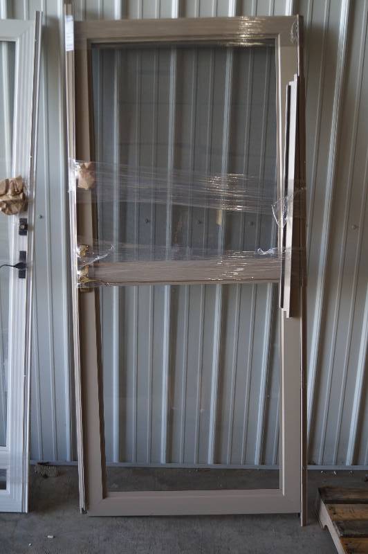 lot 17 image: NEW Storm Door