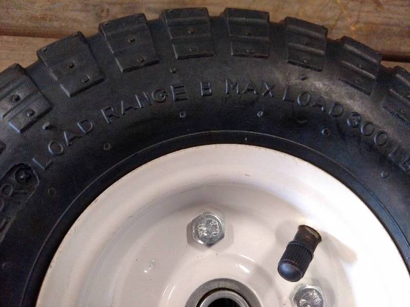 lot 27 image: (2) 4.103.50-4 Tires with Rims, 5...