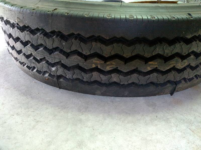 lot 18 image: Bridgestone 22570R19.5 Radial Tire...