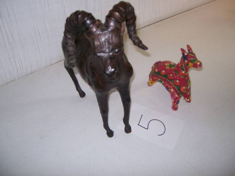 lot 5 image: Antique leather ram & embroidered alpaca