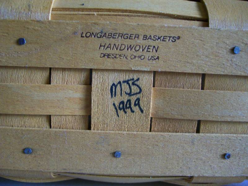 lot 25 image: Longaberger basket & large antique basket