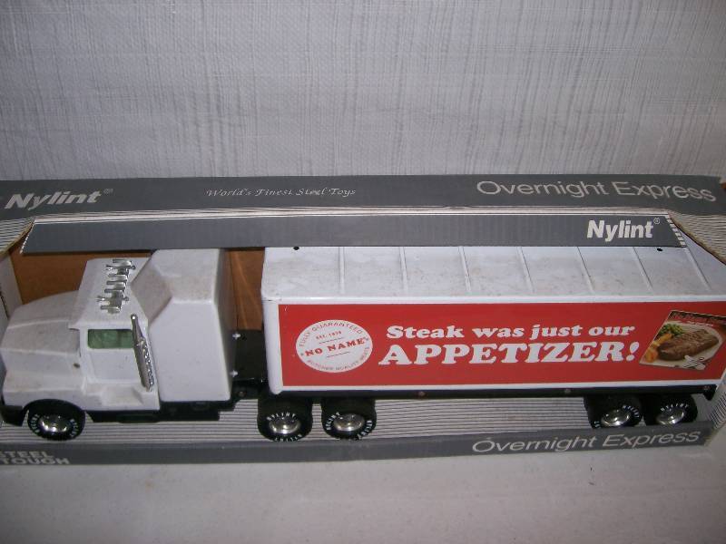 lot 53 image: Steel semi-truck collectible toys
