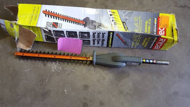 lot 123 image: Ryobi Expand-It 17-12 in. Universal Hedge Trimmer Attachment