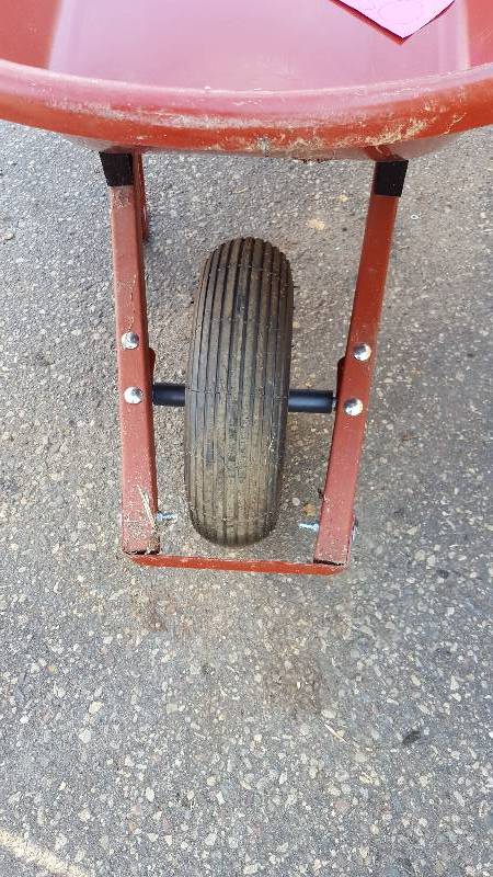 lot 130 image: Wheel Barrel small damage