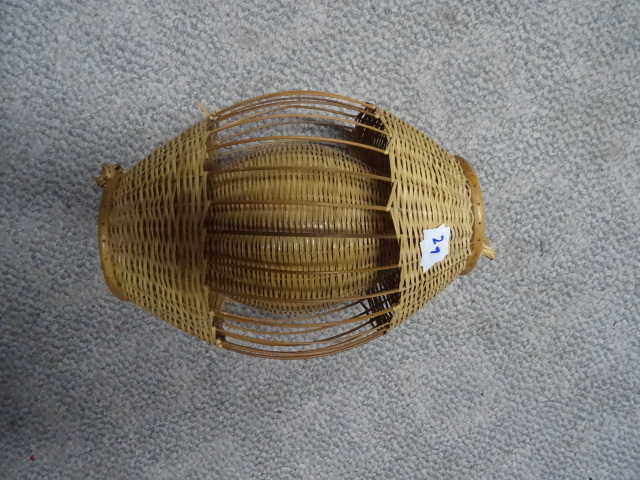 lot 29 image: Wicker lantern