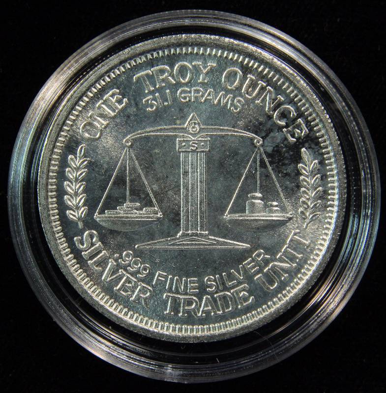 1 TROY OZ. .999 FINE SILVER 1984 MORGAN DOLLAR DESIGN IN AIRTITE HOLDER