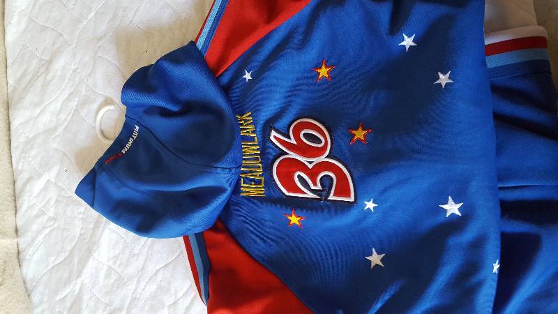 lot 24 image: Harlem Globe Trotters Jumpsuit.