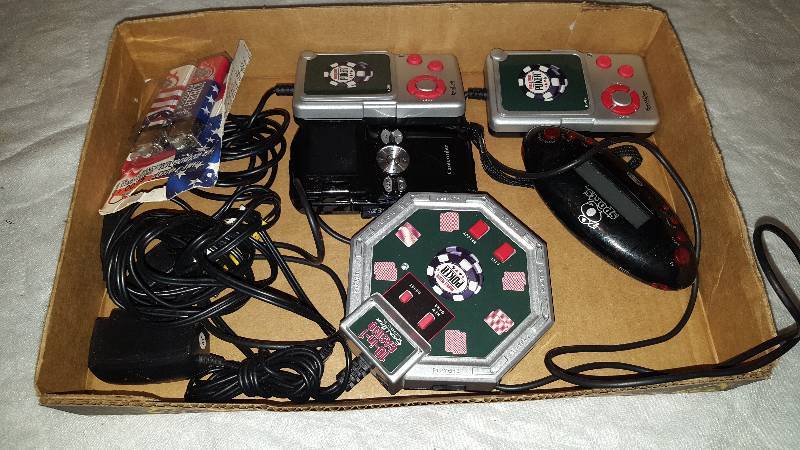 lot 54 image: Flat of handheld games & lighter
