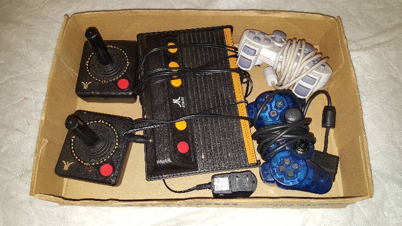 lot 63 image: Atari System w 2 Joy sticks & 2 playstation controlers
