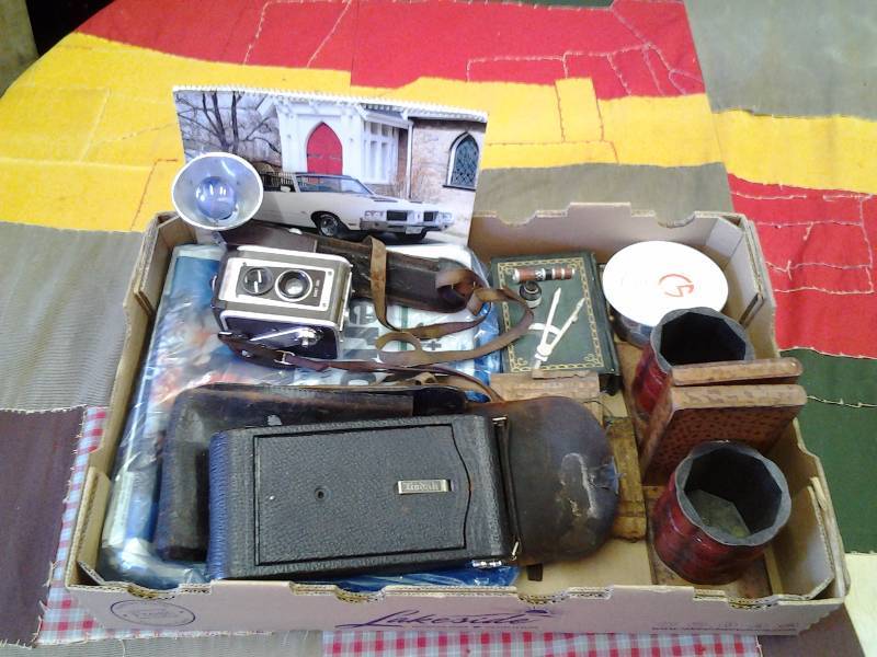 Box Lot Vintage Cameras, Book Ends, Stash Box, Old Newspapers & More