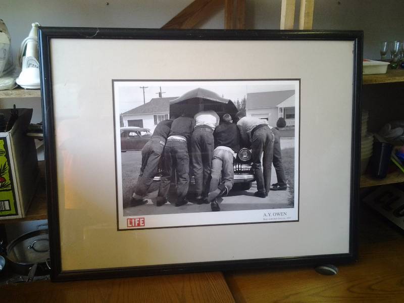 lot 18 image: Framed Life Poster-Boy With First Car 1957, By A.Y. Owen 32x43