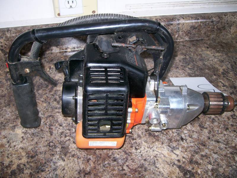 lot 57 image: Gas Powered Drill