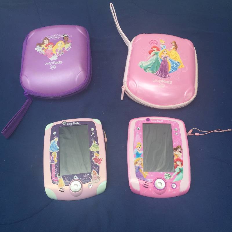 lot 142 image: 2 Princess Leap Pad2 with cases