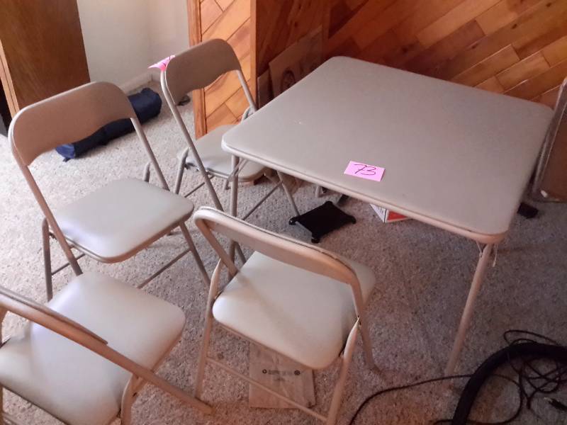 lot 73 image: Card Table with padded top.. 4 matching chairs with padded seats..   Table top has a couple of small dents in the surface (not tears).  Small ironing board