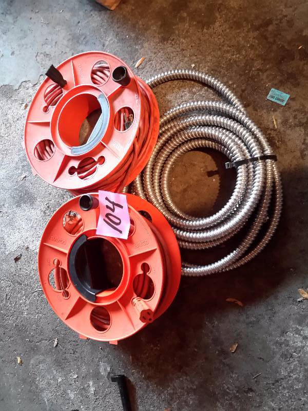 lot 104 image: 2 rolls of Electric wire and flexible conduit