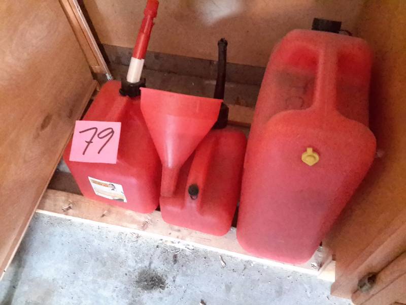 lot 79 image: 3 Gas Containers as pictured.. Looks like 1 gal, 2 gal, 4 Gallon