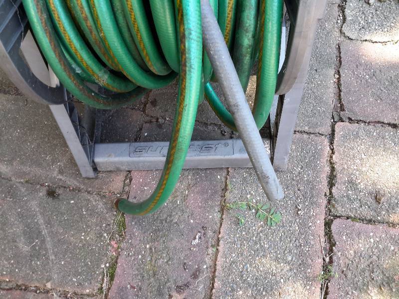 lot 18 image: Hose Reel and approx 50 ft hose.