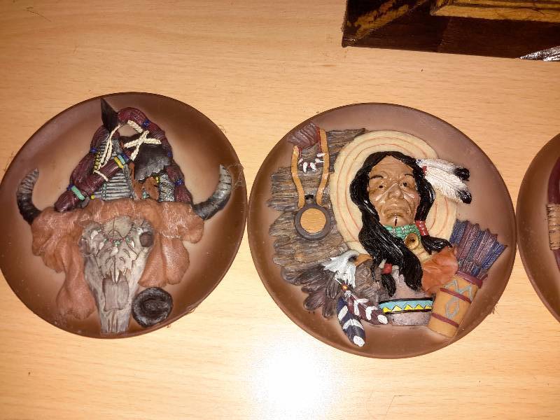 lot 47 image: Native American  Velvet picture and plaster cast Native american placques.