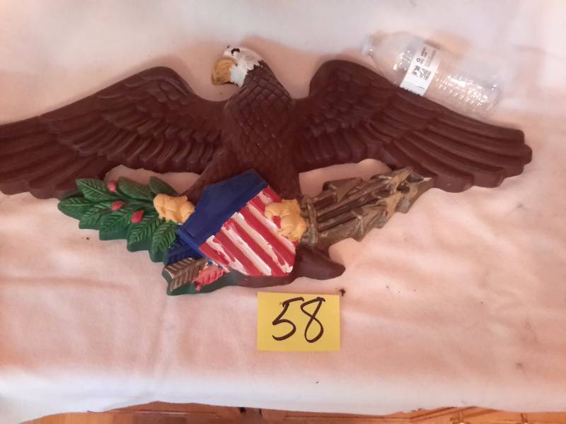 lot 58 image: Plaster Cast EAGLE wall hanging.. See water bottle for size perspective