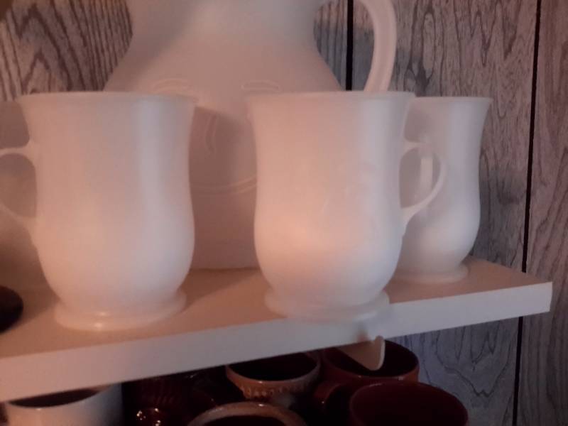 lot 107 image: Misc. Glassware and plastic as pictured.. Plastic KOOL AID Pitcher and mugs