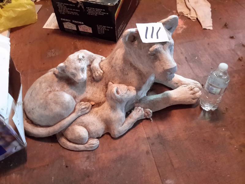 lot 111 image: Unpainted Lioness with cubs, Cement Cast statue.. Very large.. See water botter for size perspective