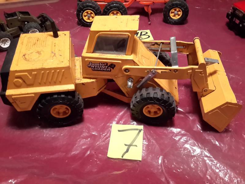 lot 7 image: Nylynt and Scoop  and Snorkel Rescue Ladder Truck.