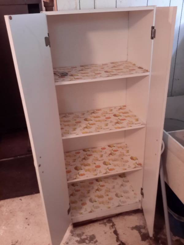 lot 145 image: Laminate covered cabinet.. 24in w x 15in d x 72in h.. In basement.. B ring your own loading help.. We do not do this.
