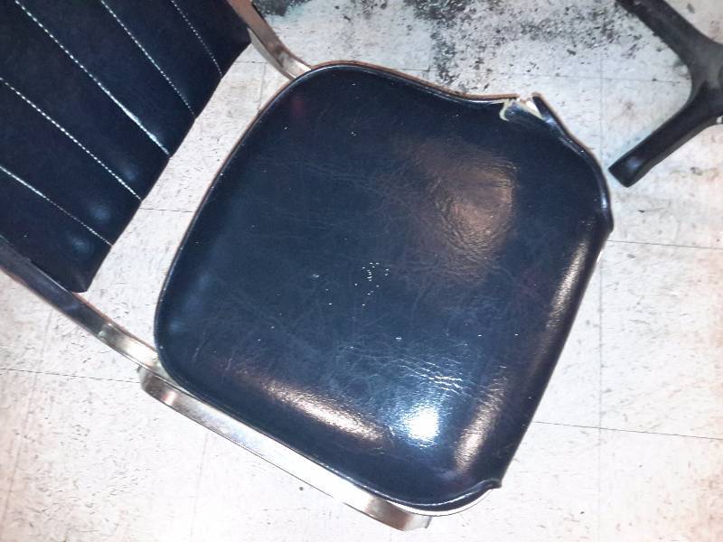 lot 159 image: 36in x 36in simulated wood table with two chairs.. One chair needs some upholstery repair.  All very solid