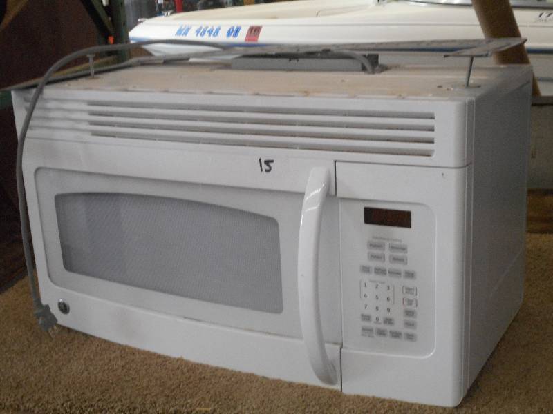 lot 15 image: GE Under-Cabinet Microwave, Mount P...