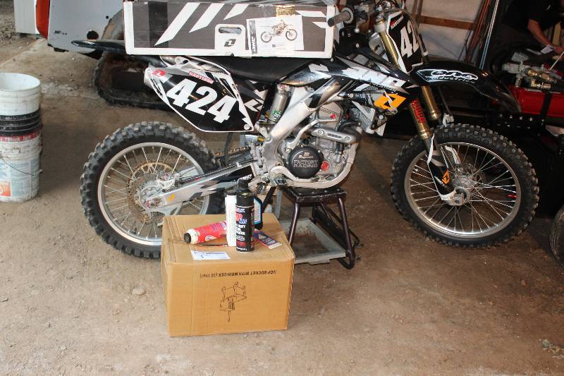 lot 3 image: 2009 Honda CRF250R SilverBlack One Dirt bike w OEM Plastics, Parts & Stand