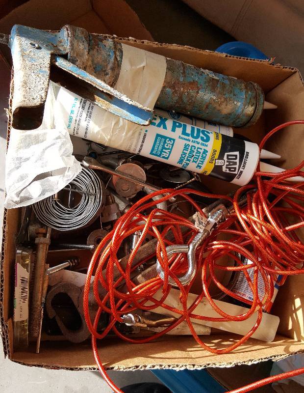Lot of new caulk, metal cord and much more