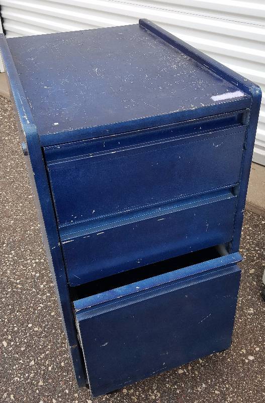 Blue shelf on wheels