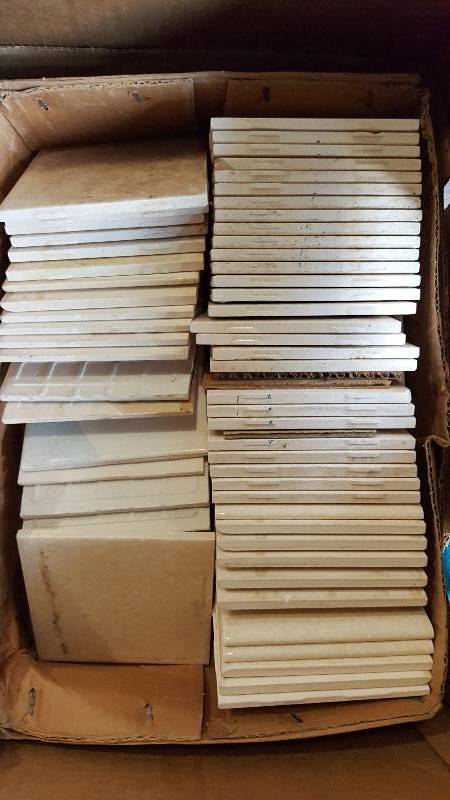 about 50 assorted small tiles
