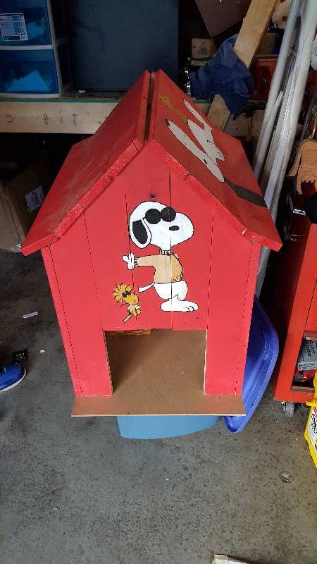 Large homemade red dog house
