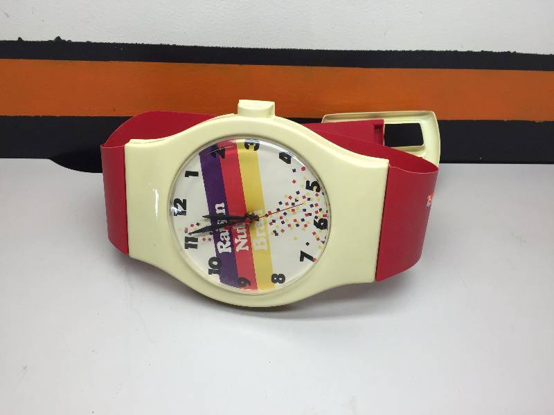 lot 23 image: VINTAGE MICKEY MOUSE PUZZLE, KIDS POTS AND PANS, ASSORTED TOYS, LARGE RAISIN BRAN WATCH