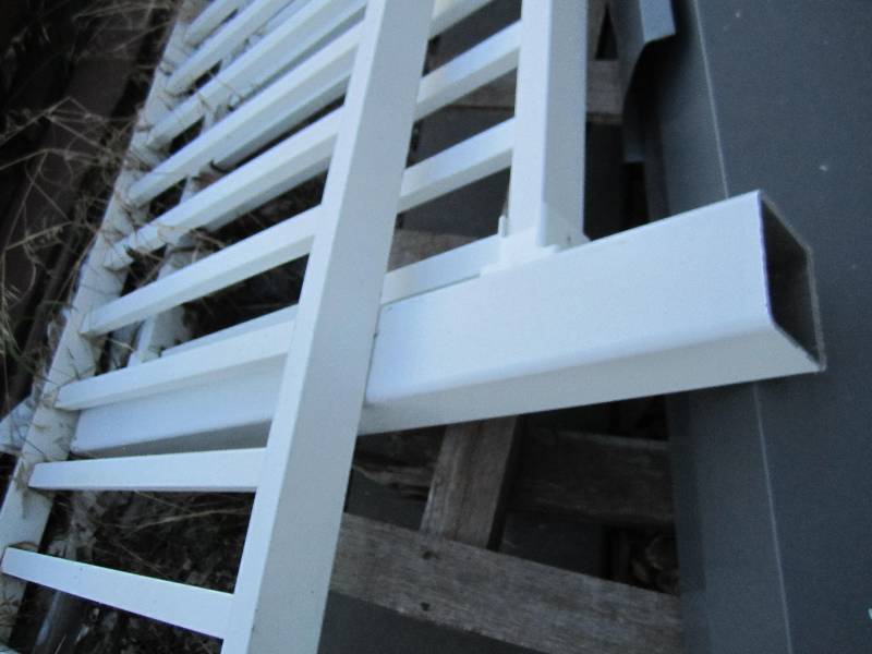 White plastic deck railing, one 8 ...