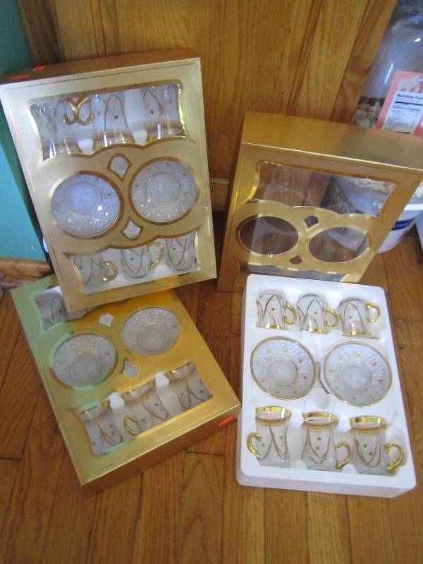 Lot of 3 tea sets with gold rims an...