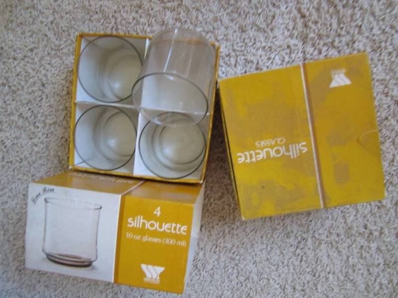 2 sets of 4 shillouette fine rimmed...