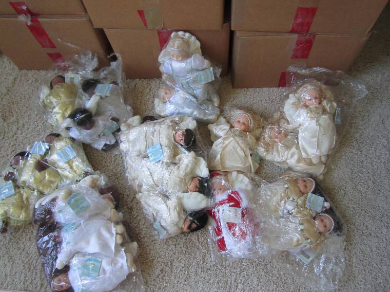 Large lot display of dolls...