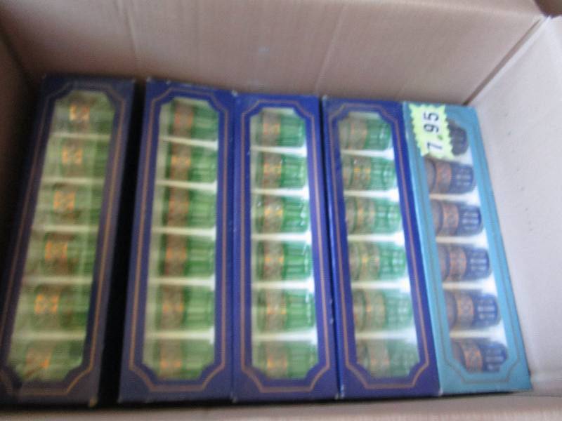10 sets of 6 green and blue glasses...
