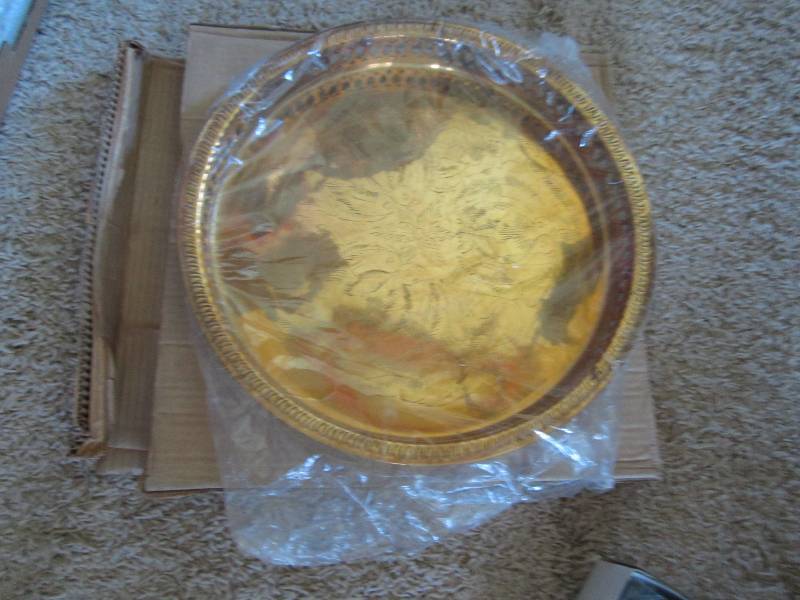 Gold colored serving platter made i...