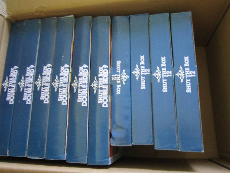 Box of board games called Shut the ...