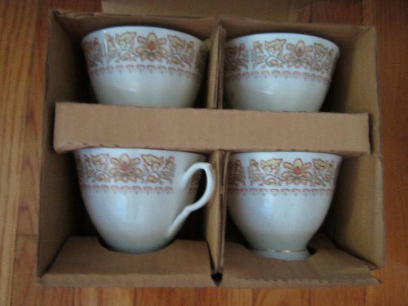 set of 4 tea cups and saucers...