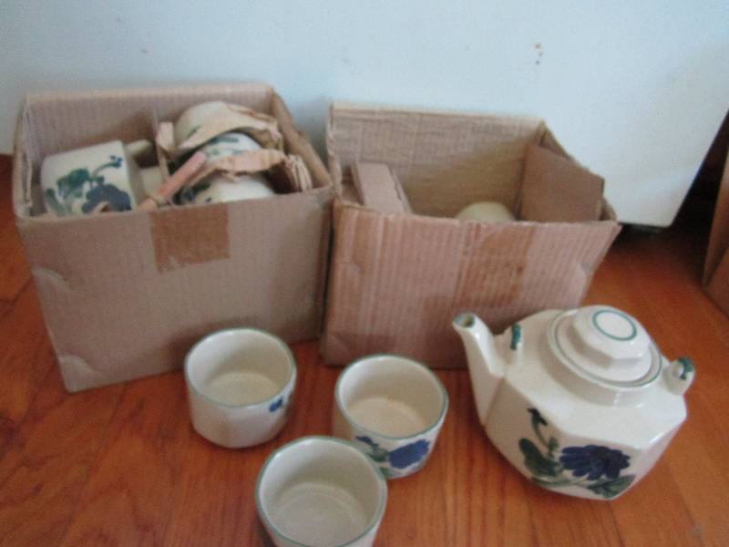 2 sets of one tea pot and 6 matchin...