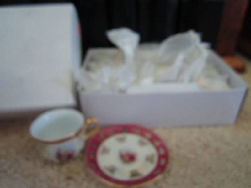 Set of six tea cups and matching sa...