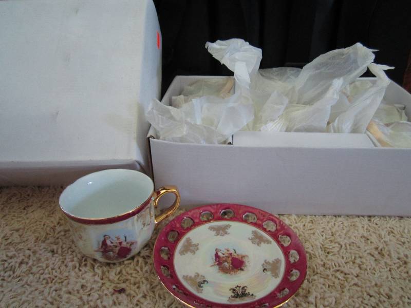 Set of six tea cups and matching sa...